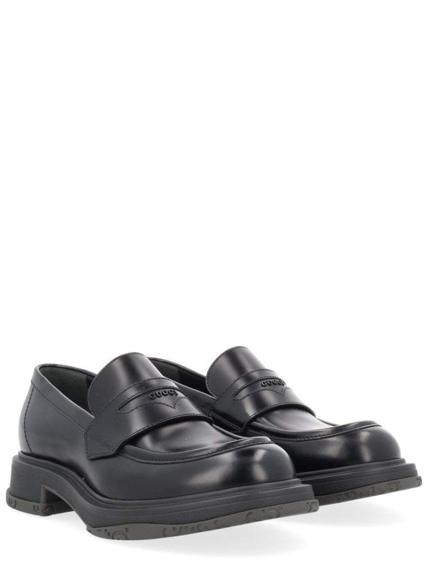 Gucci Black Leather Penny Loafers