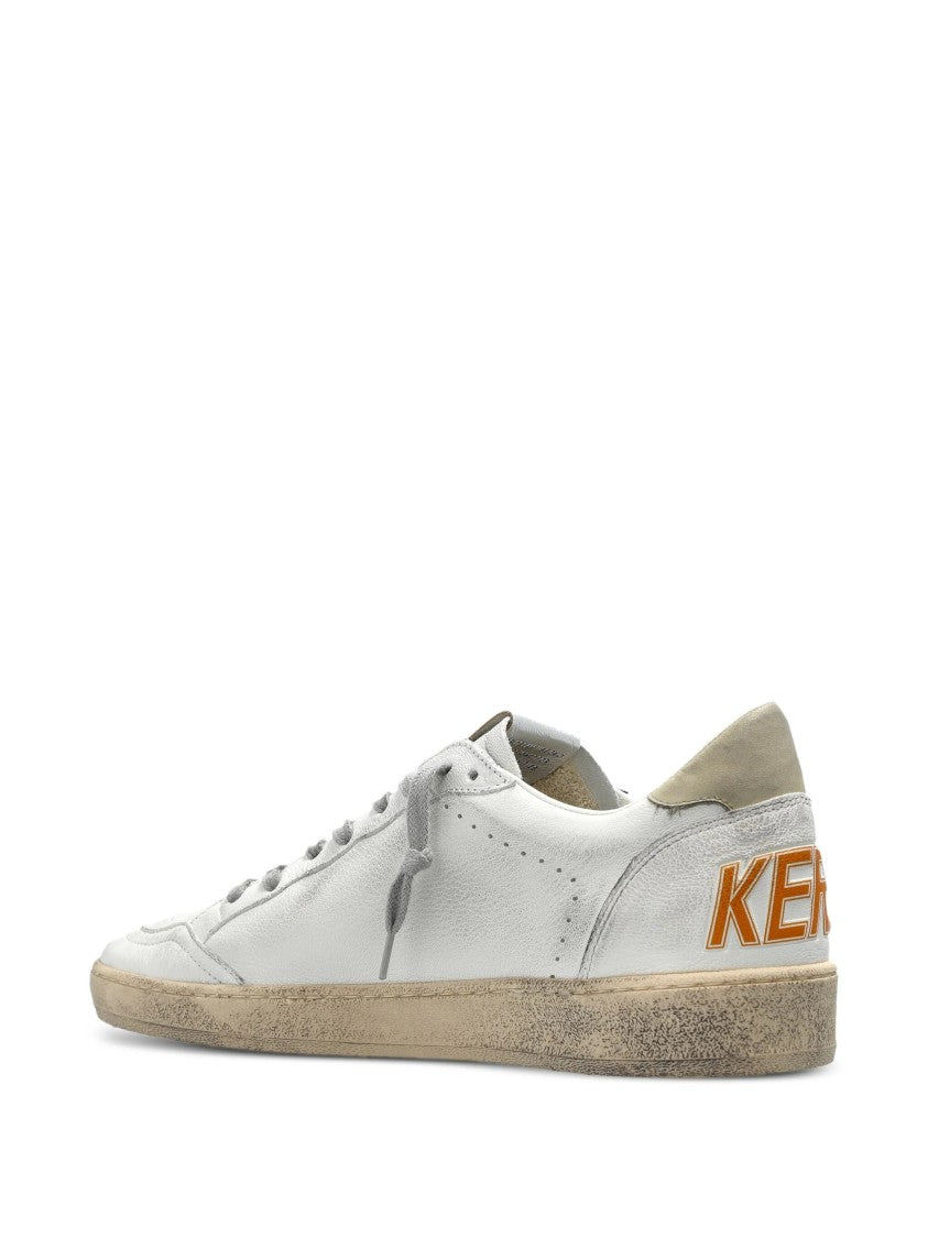 Golden Goose Distressed Low-Top Sneakers With Star Detail And Vintage Aesthetic
