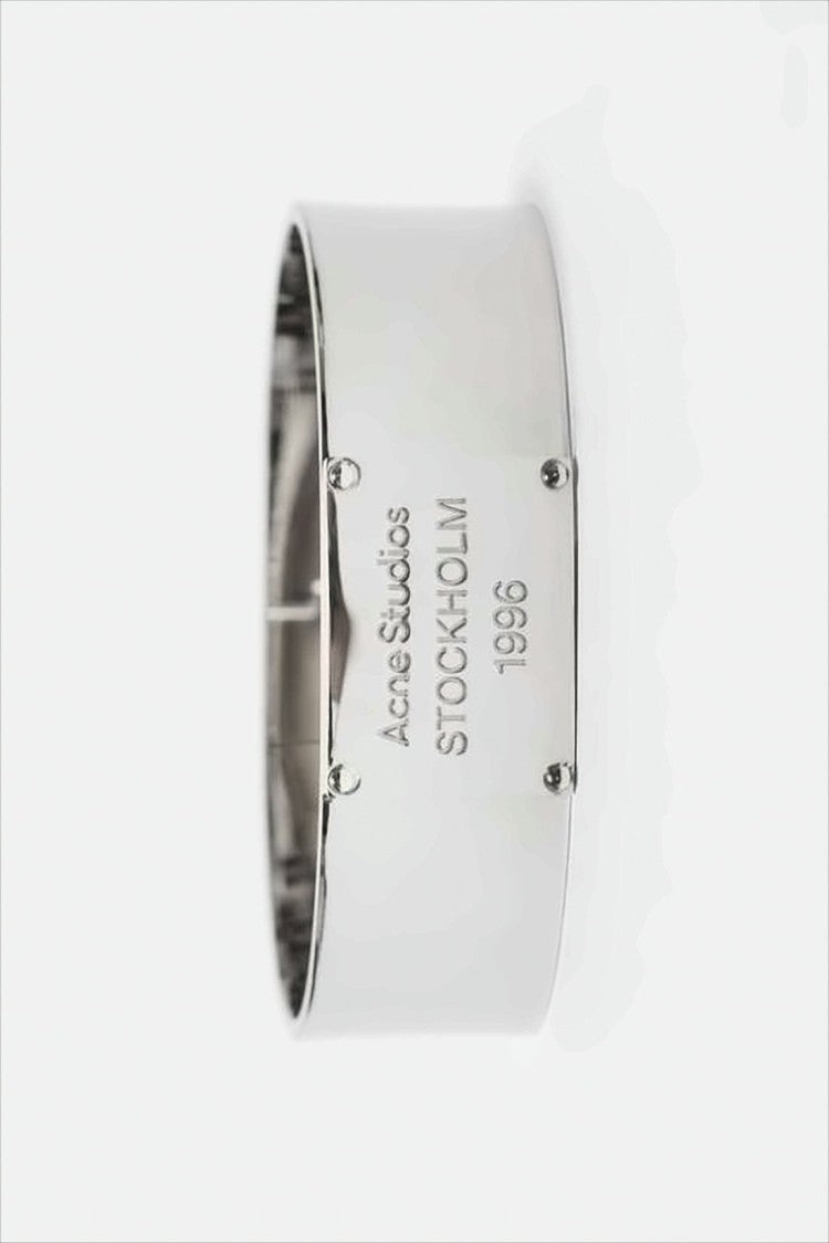 Acne Studios Polished Brass Ring With Engraved Detailing
