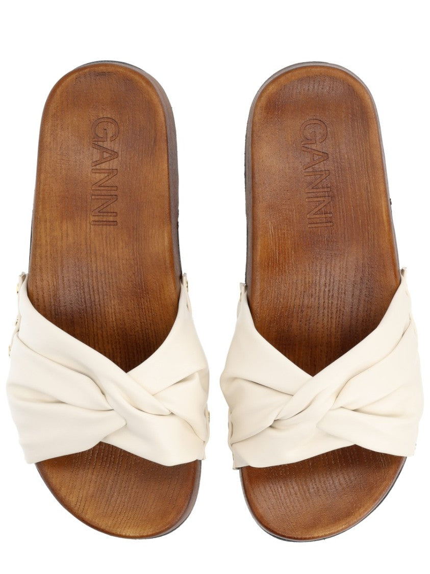 Ganni Tia Fairy Twisted Strap Wood Mules