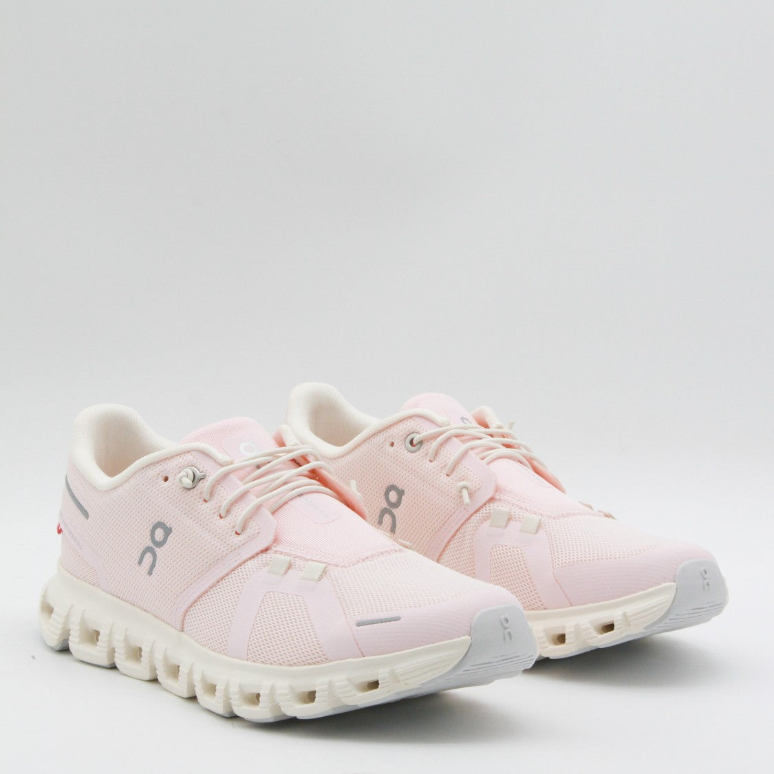 On Pastel Pink Mesh Sneakers With Reflective Accents