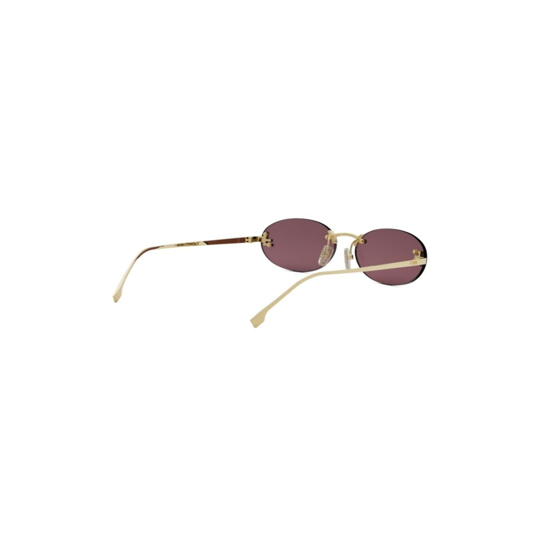 Fendi Oval Lens Sunglasses With Gold-Toned Frame And Tinted Lenses
