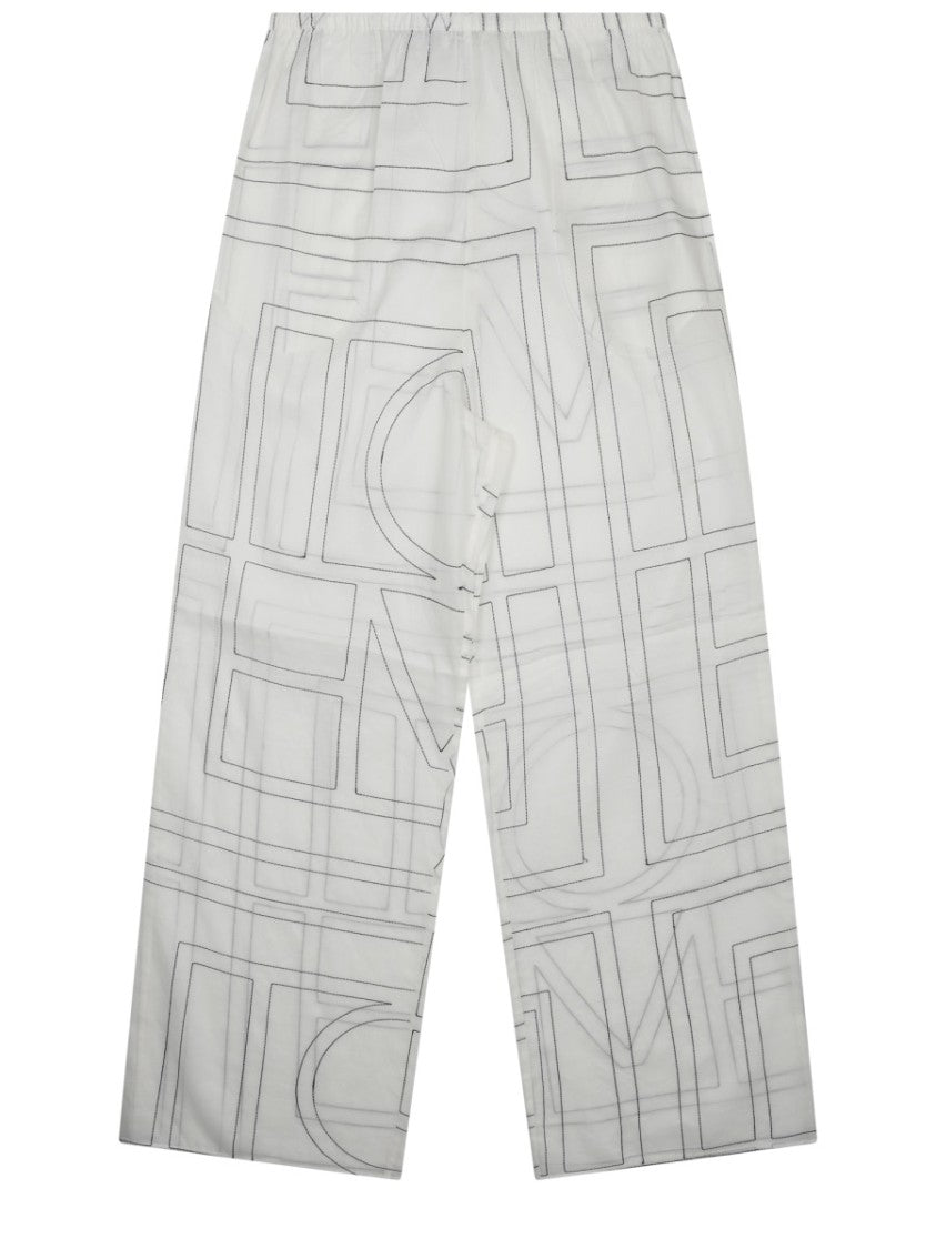 Totême Wide-Leg Pants With Subtle Monogram And Relaxed Fit