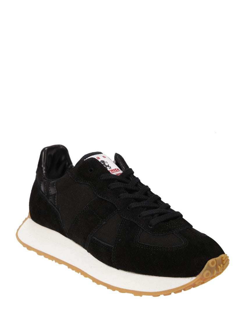 Tao Black Sneakers With Contrasting White And Brown Sole