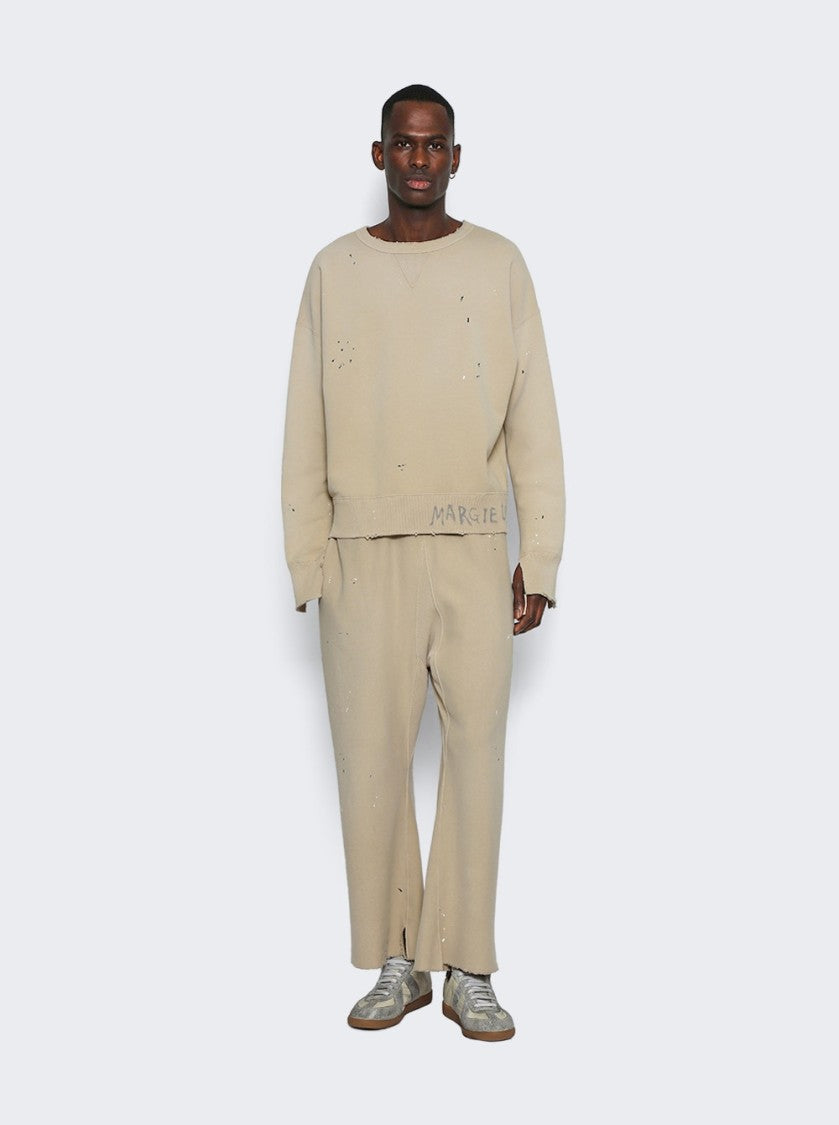 Maison Margiela Relaxed-Fit Beige Pants With Flared Leg And Unique Stitching