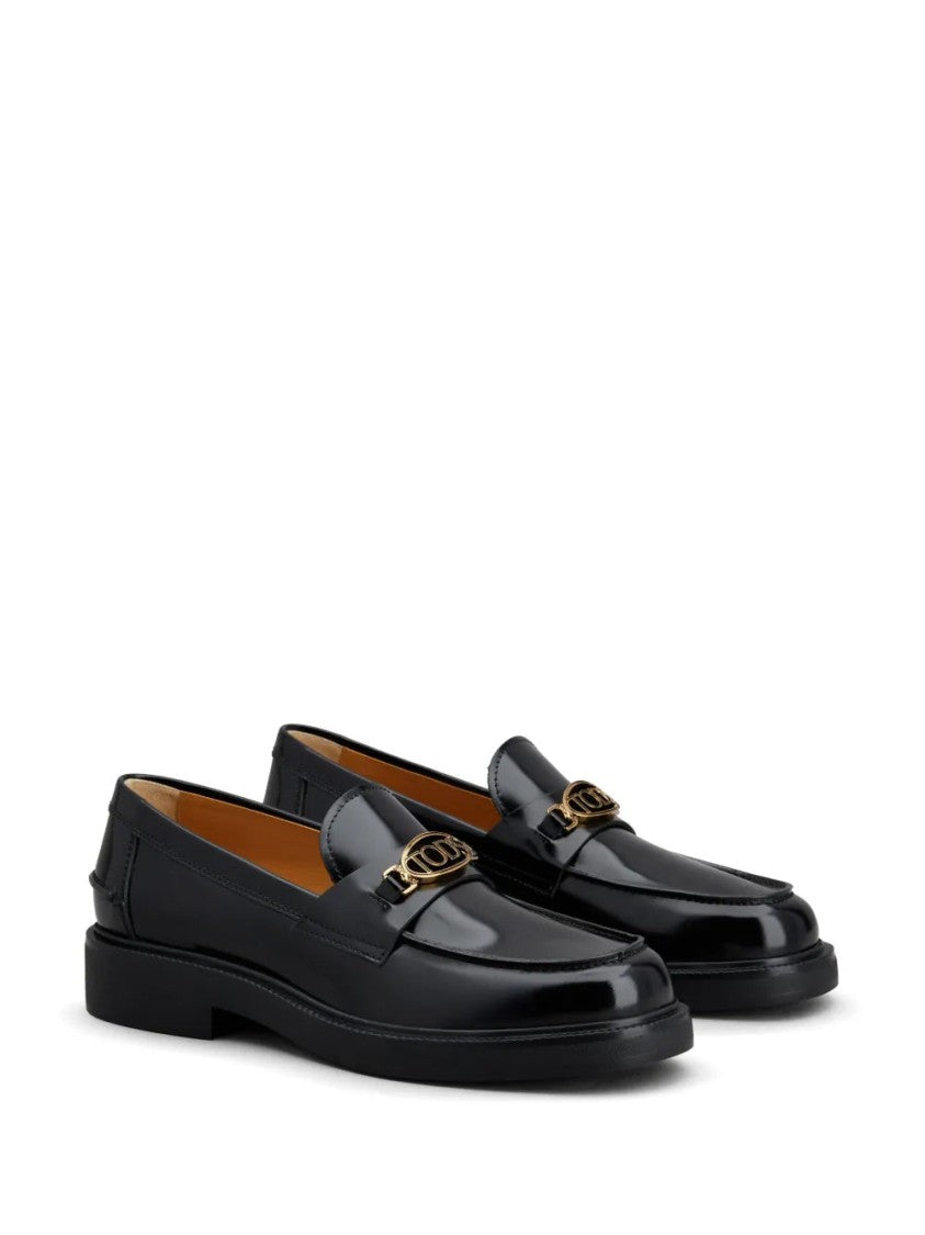 Tod's Glossy Black Leather Loafers With Decorative Emblem
