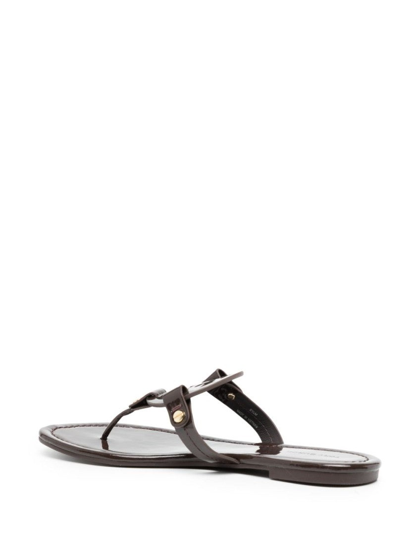 Tory Burch Glossy Black Flats With Circular Emblem Detail