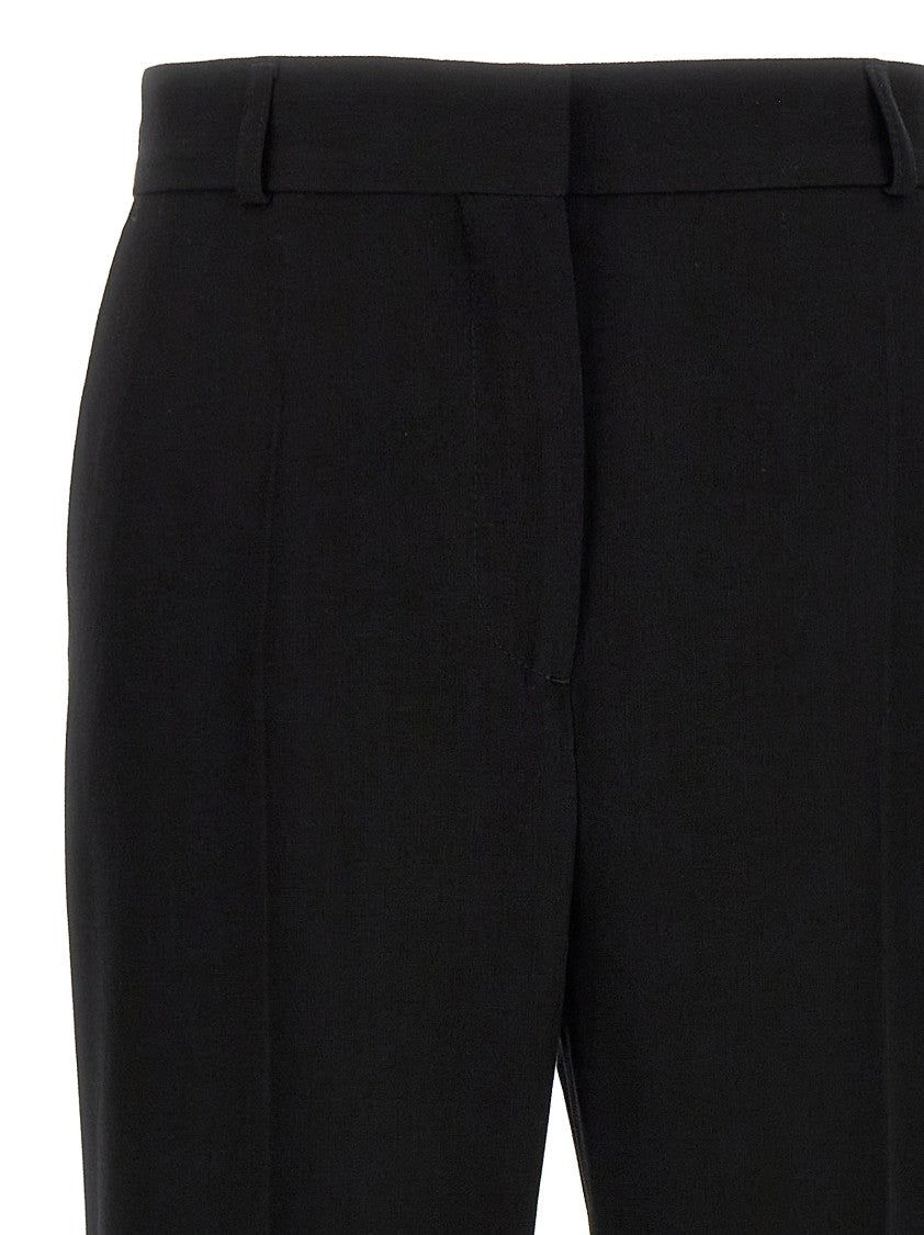 Totême Flared Trousers With Stretched Pleat And Tailored Fit
