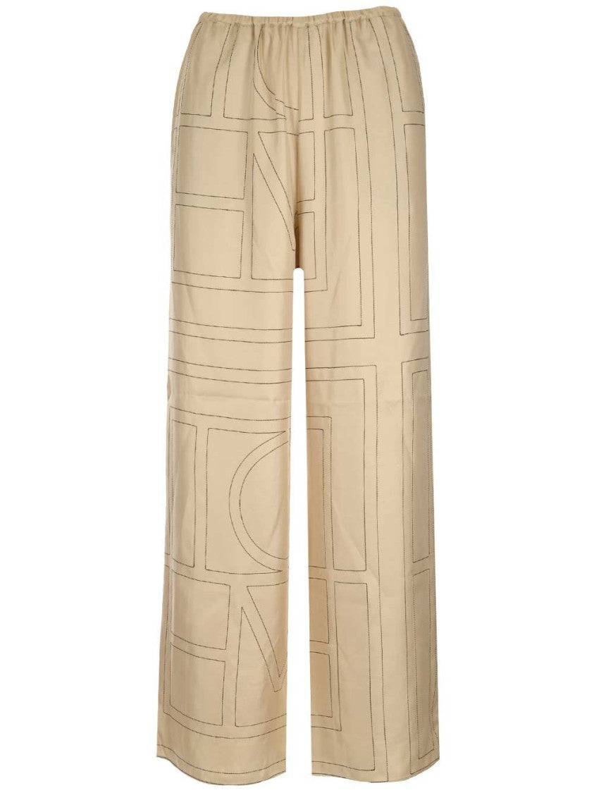 Totême Cropped Silk Pajama Bottoms With Subtle Monogram Pattern
