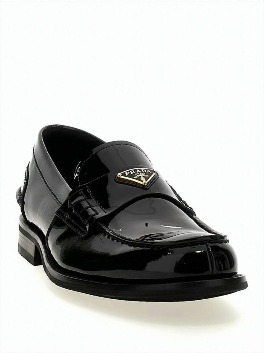 Prada Polished Calf Leather Loafers With Metallic Emblem