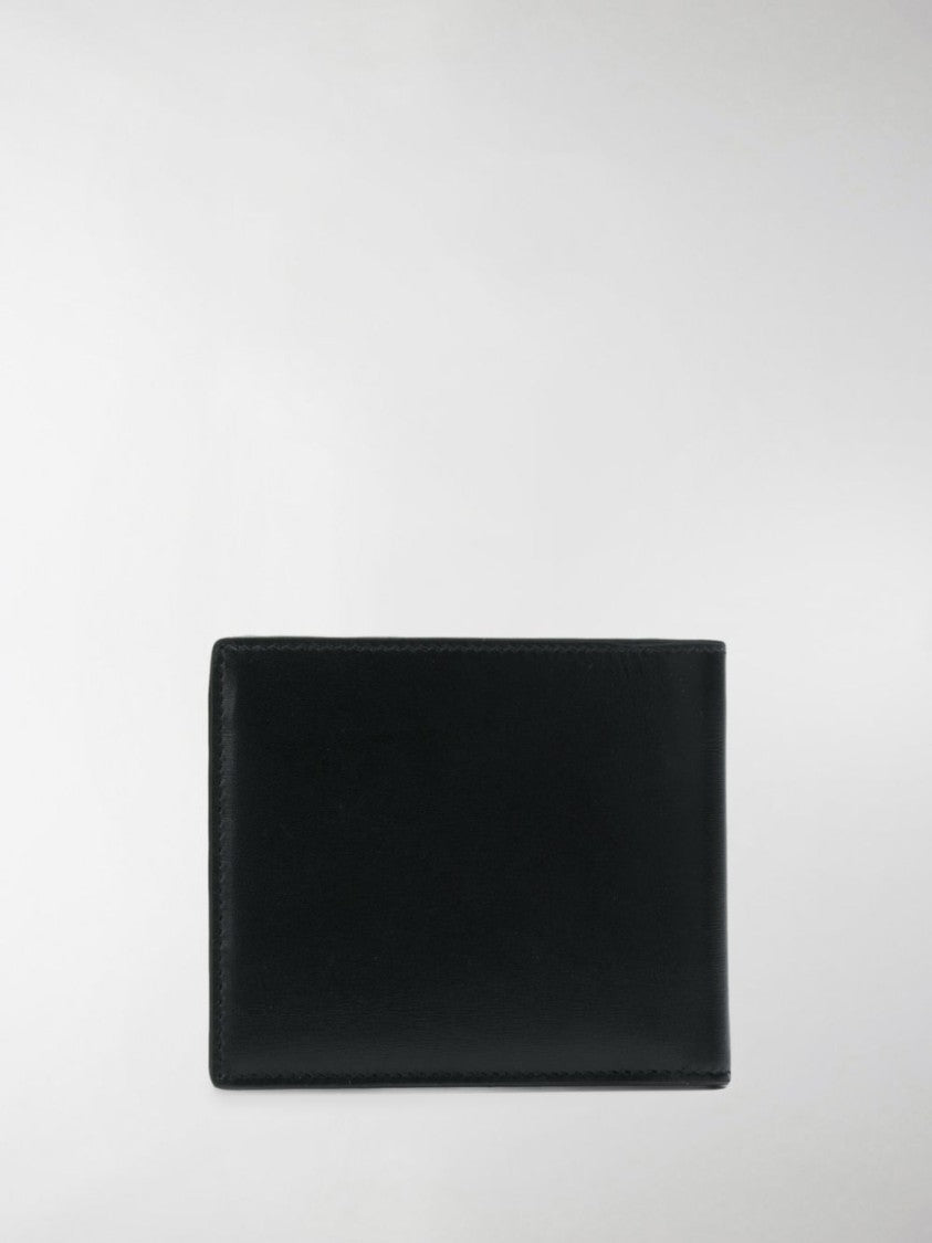 Saint Laurent East/West Monogram Wallet In Black Leather