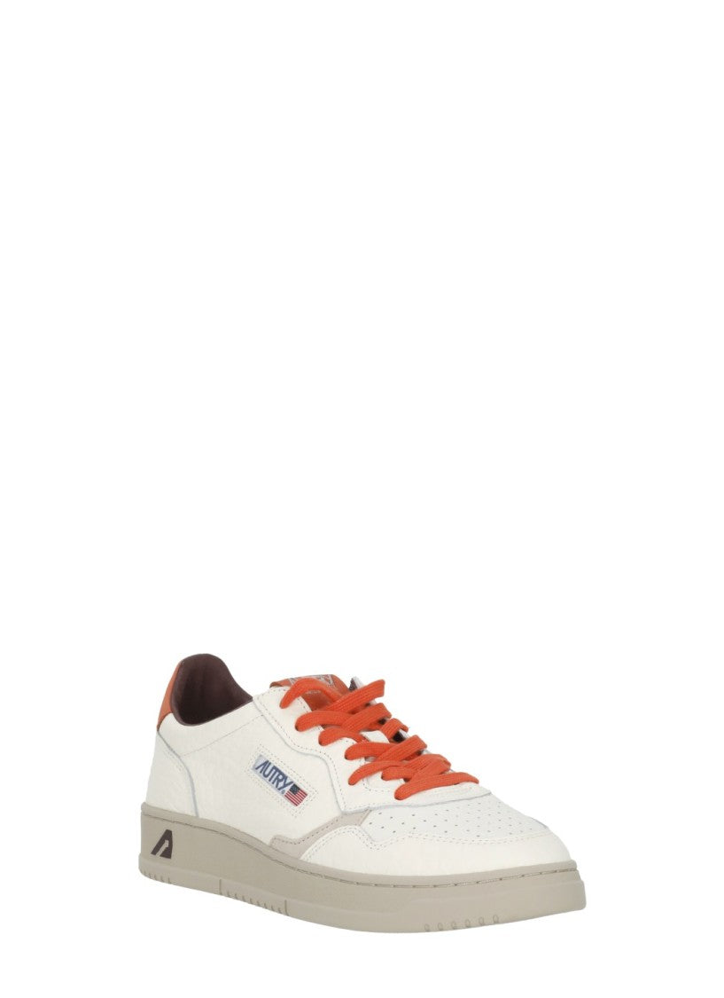 Autry White Grey Suede Orange Accents Low-Top Sneakers