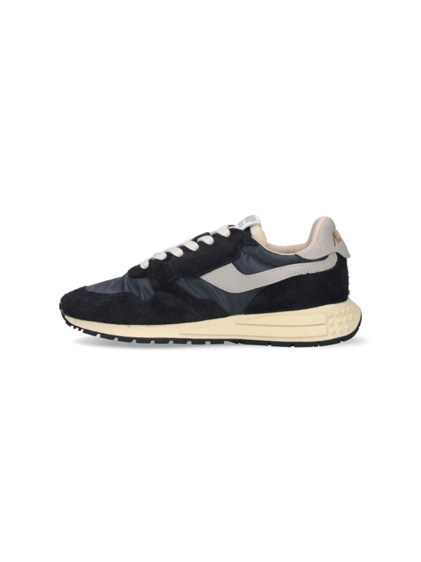 Autry Streamlined Black Sneakers With Minimalist Design