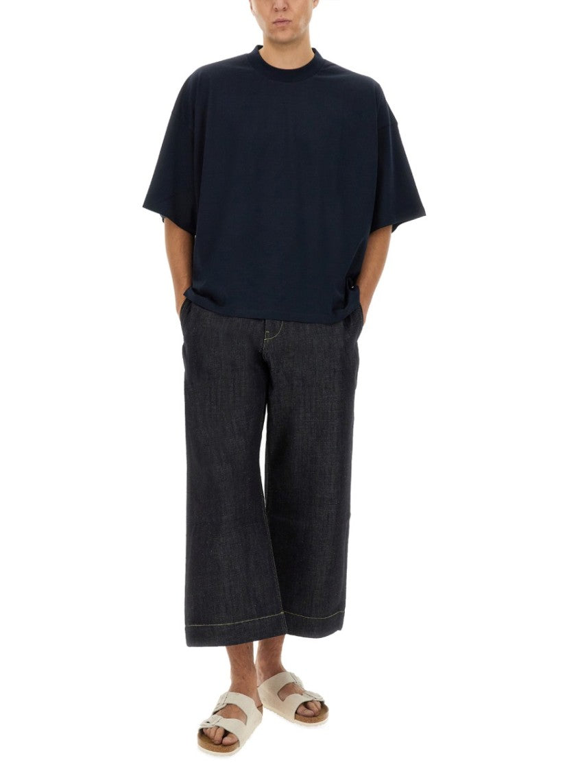 Studio Nicholson Wide-Leg Cropped Denim Trousers With Leather Label