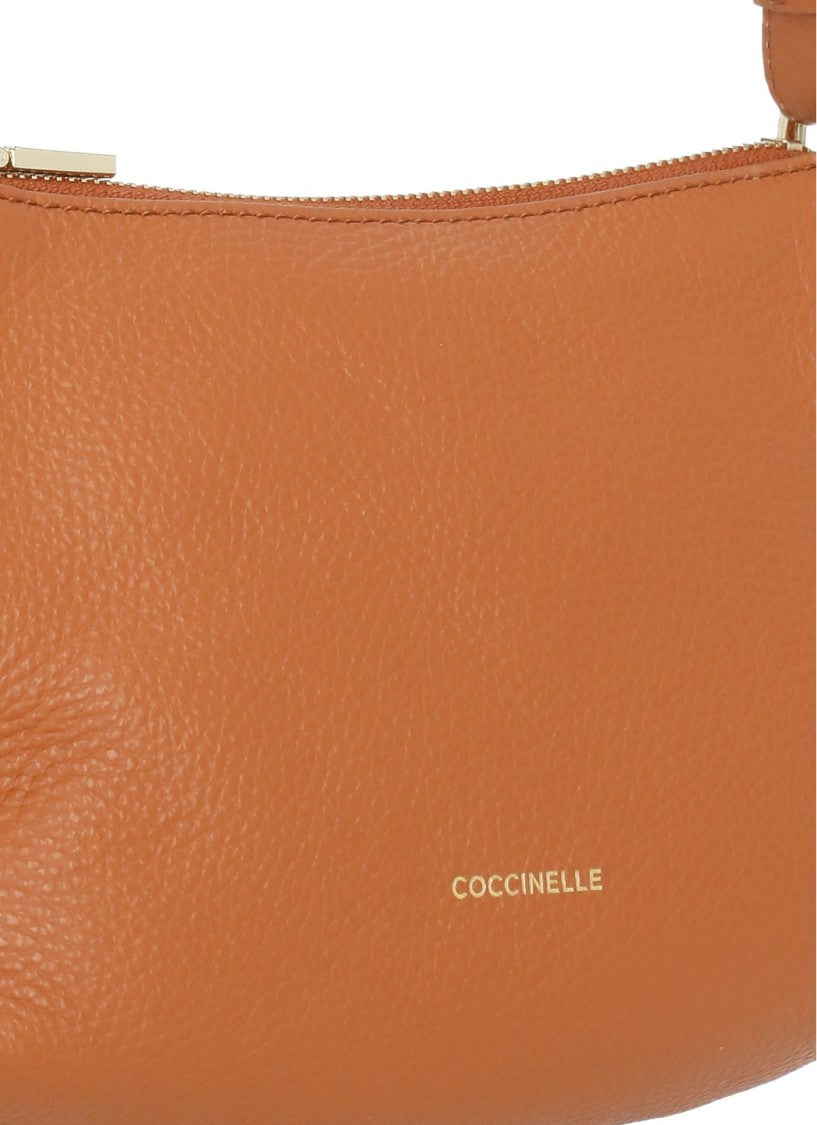 Coccinelle Compact Pebbled Leather Shoulder Bag With Gold Logo