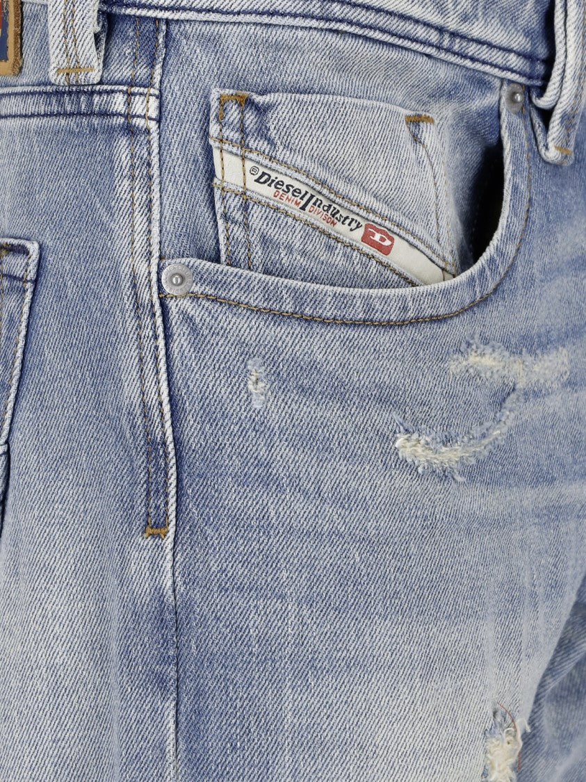 Diesel Light Blue Distressed Jeans With Classic Five-Pocket Design