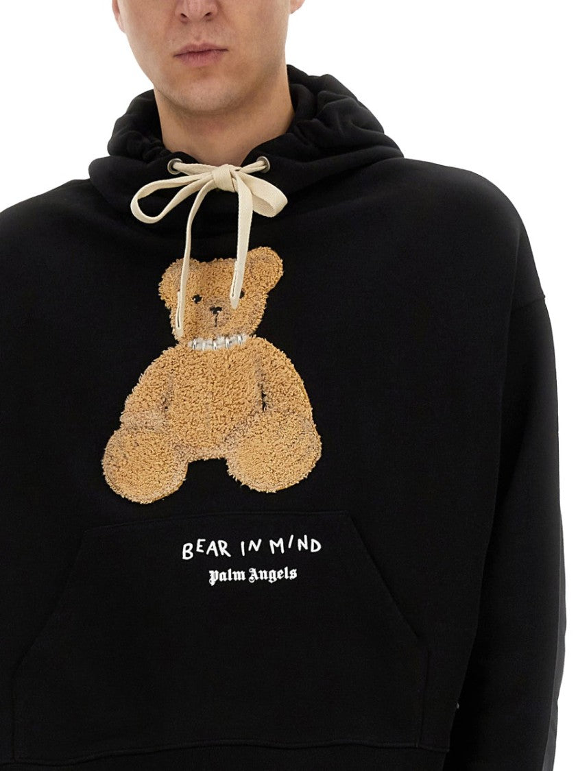 Palm Angels Cropped Black Hoodie With Teddy Bear Graphic