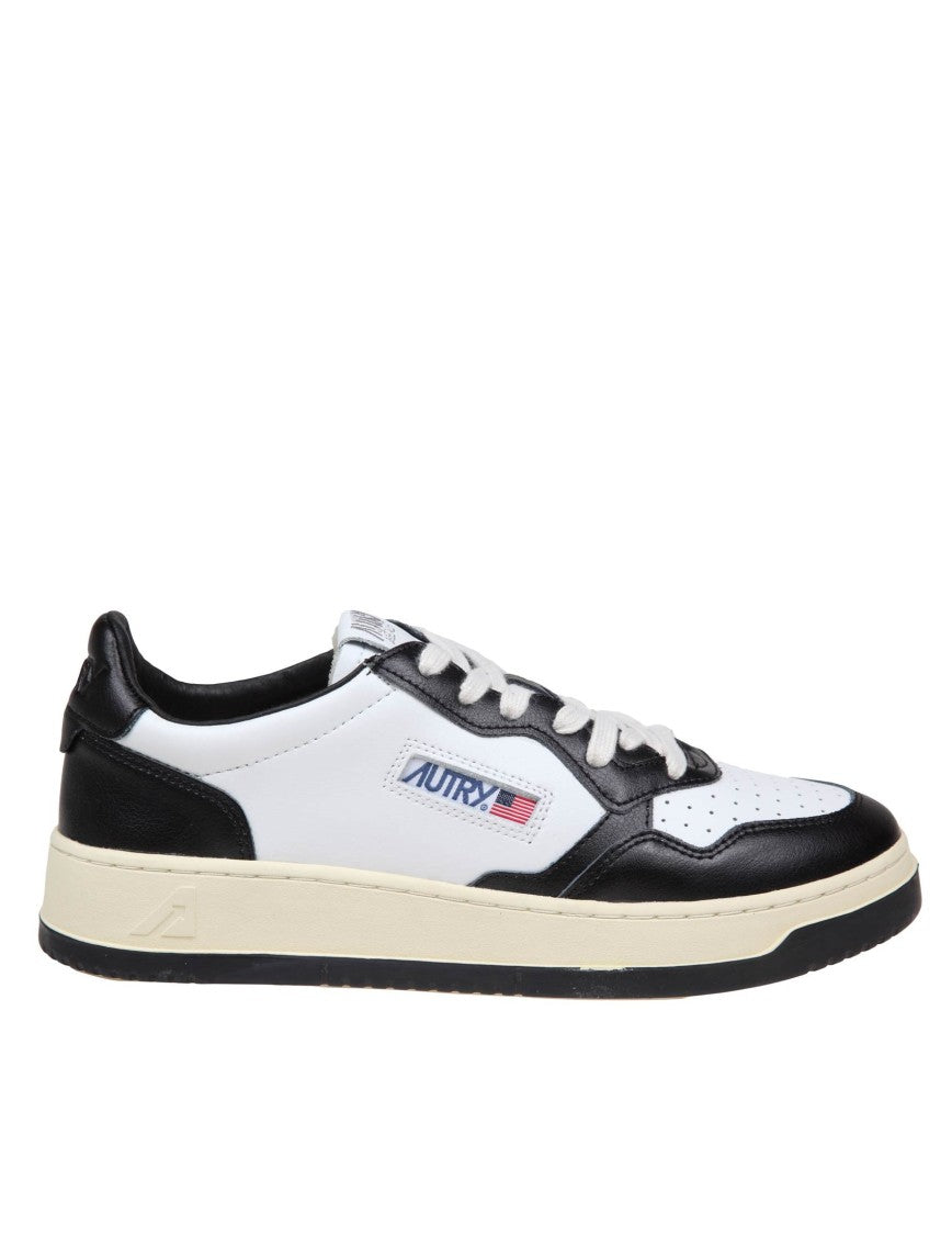 Autry Sneakers In Black And White Leather