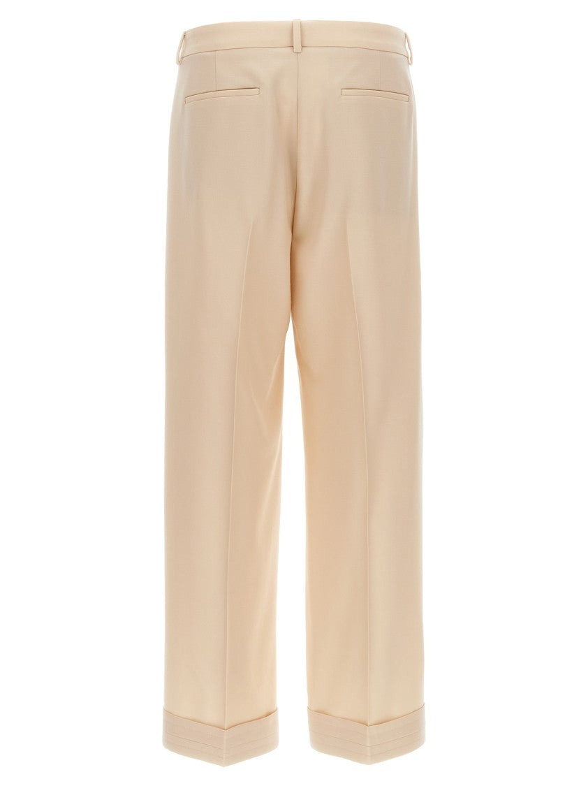 Valentino Garavani Wide Leg Wool Trousers With Turn-Up Hem