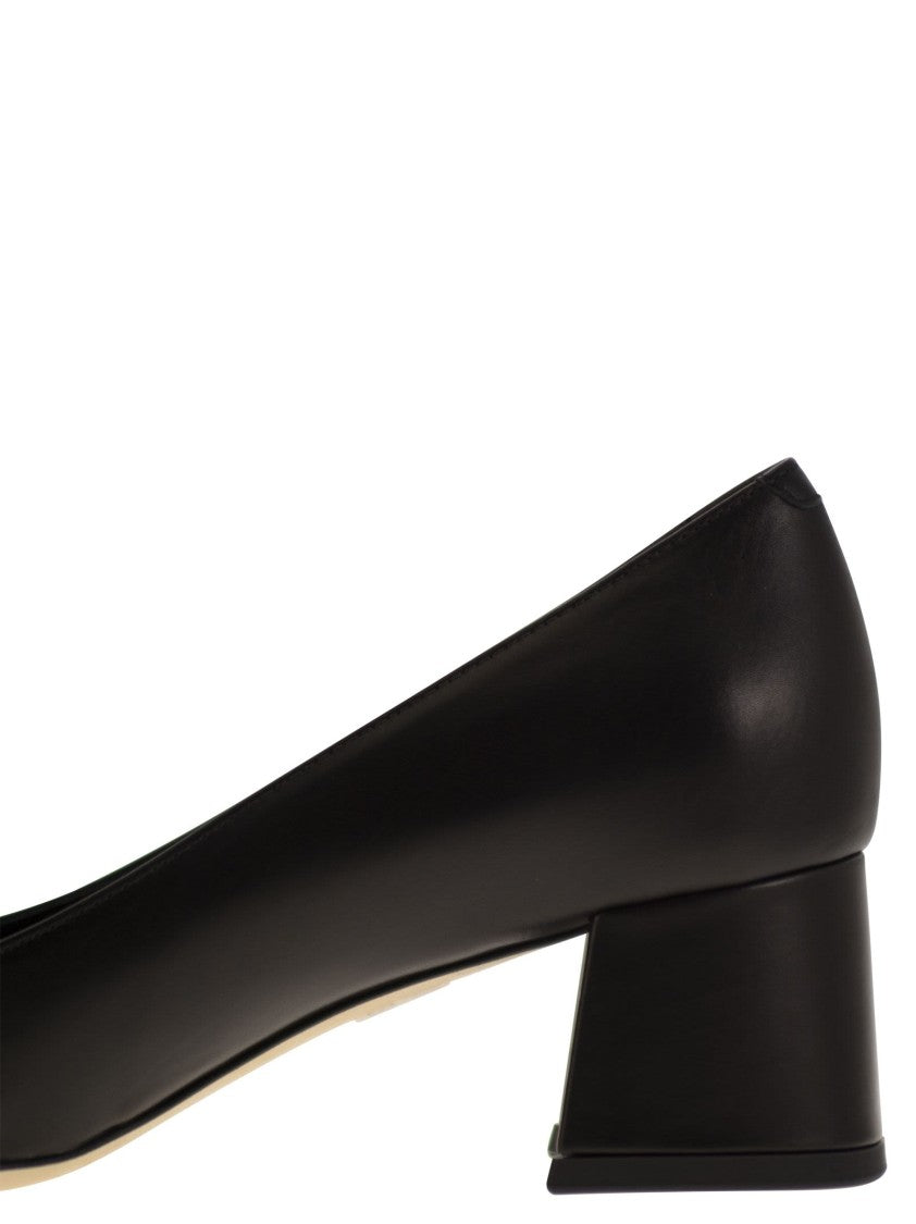 Tod's Calfskin Pumps With Custom Metal Chain Accent