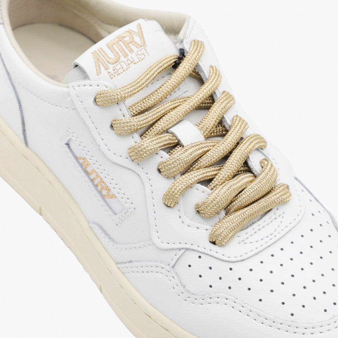 Autry Minimalist White Leather Sneakers With Perforated Detailing