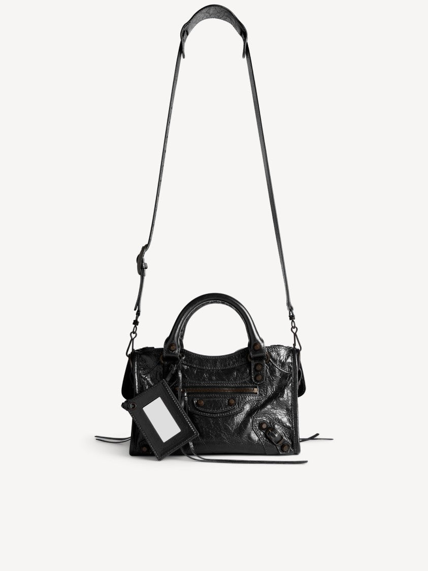 Balenciaga Compact Textured Handbag With Braided Detailing And Glossy Finish