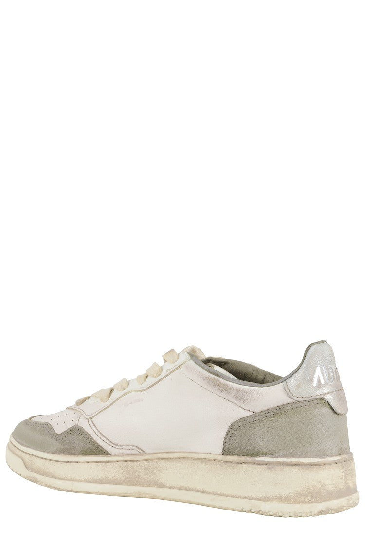 Autry Vintage Leather Sneakers With Pointed Toe And Signature Heel