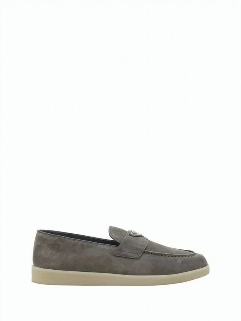 Prada Soft Suede Loafers With Metallic Emblem