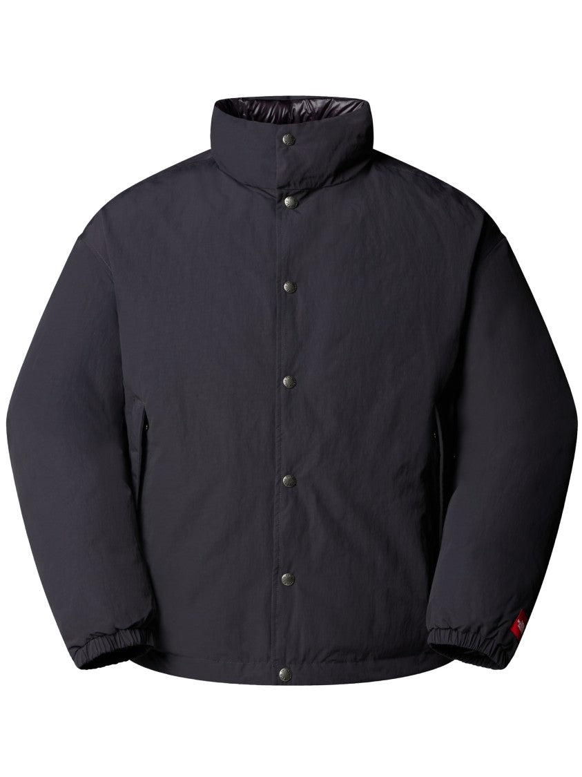 The North Face Cropped Black Down Jacket With High Collar And Snap Closure