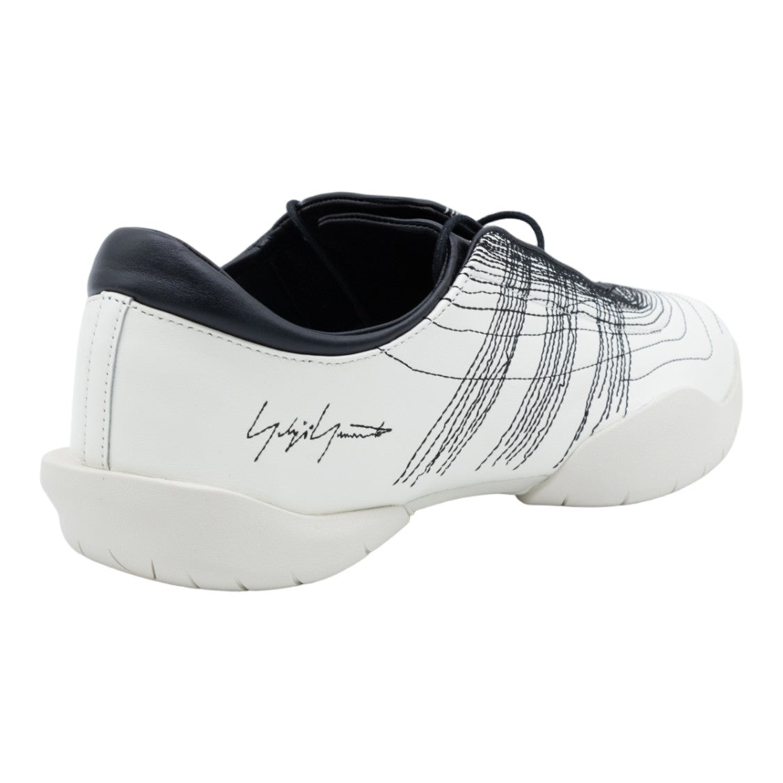 Y-3 Minimalist White Sneakers With Intricate Black Patterns