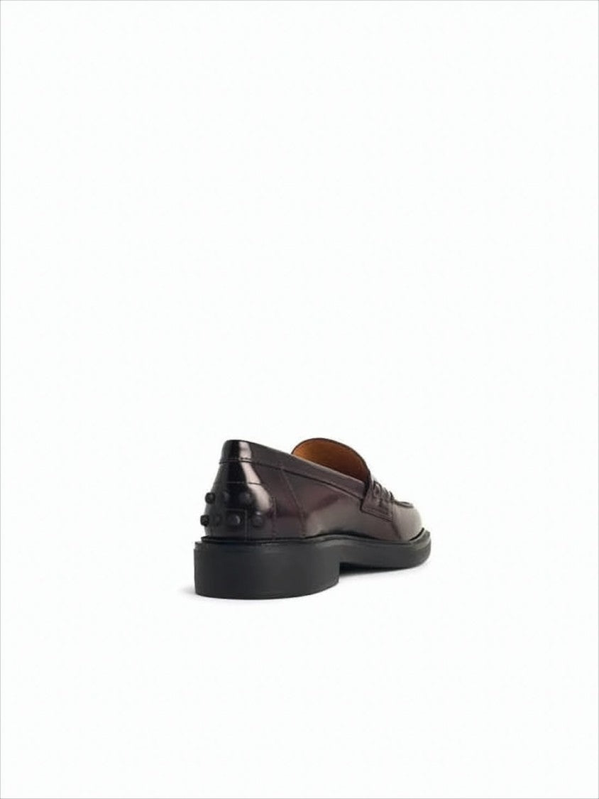 Tod's Polished Burgundy Loafer With Signature Pebbled Sole