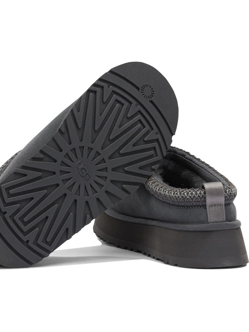 Ugg Black Slip-On Loafers With Braided Trim And Textured Sole