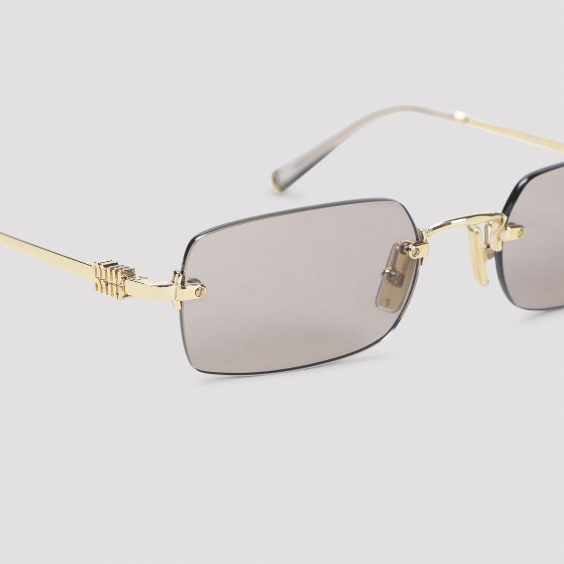 Miu Miu Eyewear Shiny Gold Metallic Signature Mini Sunglasses