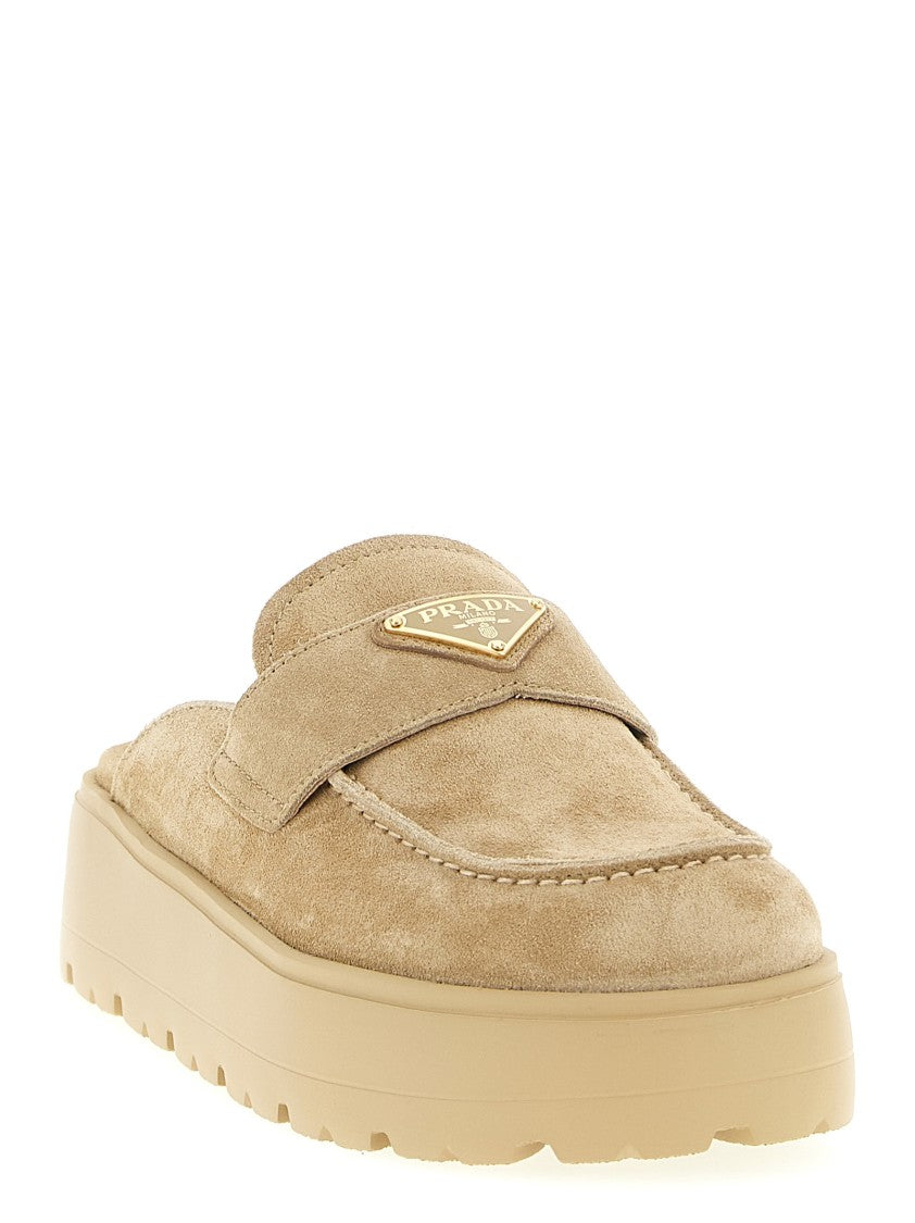 Prada Suede Sabots With Enameled Triangle Logo