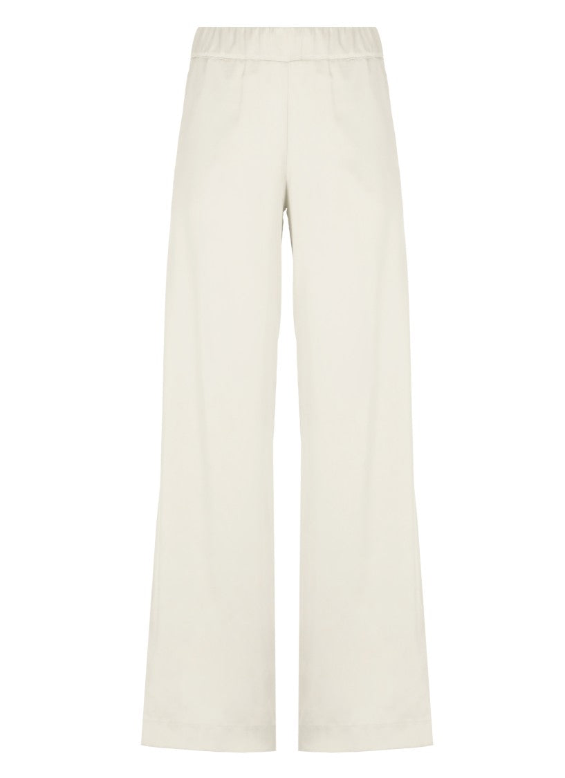 D. Exterior Beige Satin Pants