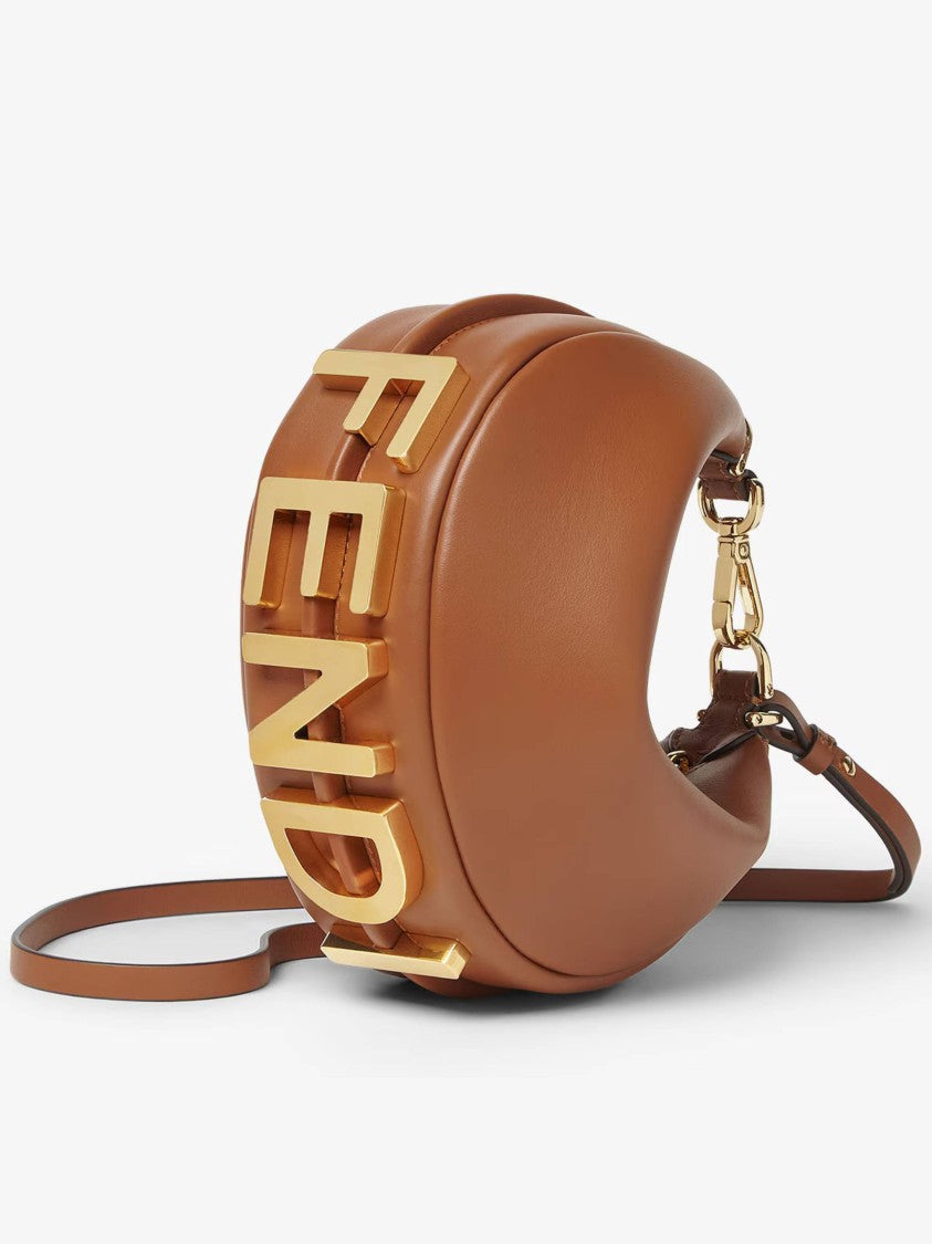 Fendi Crescent-Shaped Leather Handbag With Polished Finish And Bold Letter Embellishments
