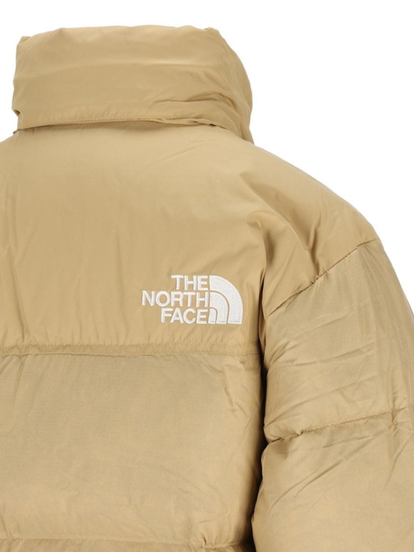 The North Face Boxy Silhouette Puffer Jacket With High Collar And Zip Pockets