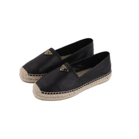 Prada Sleek Nappa Leather Black Flats With Espadrille Trim