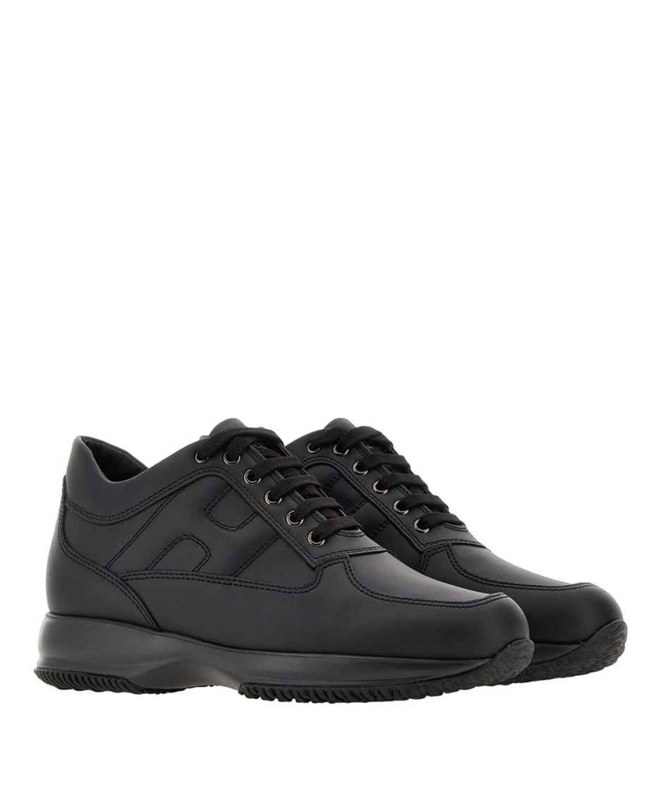 Hogan Contemporary Black Calfskin Sneakers With Elegant Design