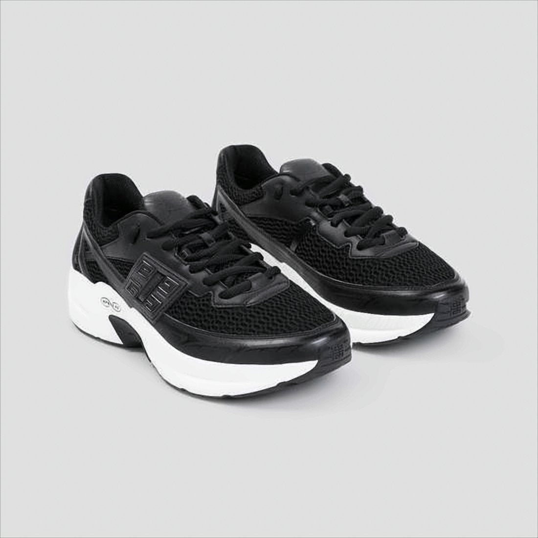 Givenchy Sleek Black Mesh And Leather Sneakers With Distinctive Logo