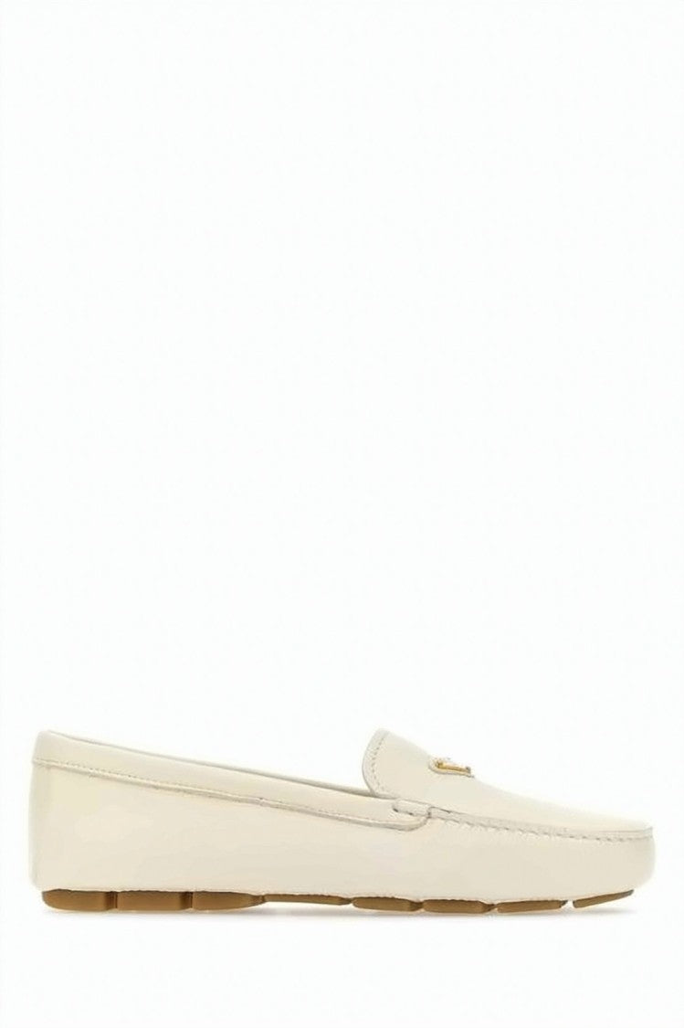 Prada Leather Loafer With Rubber Sole And Metallic Emblem
