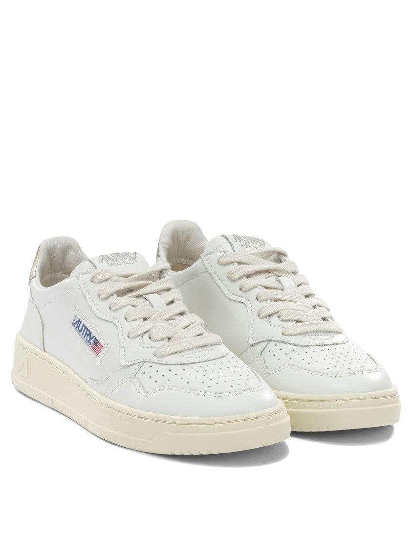 Autry Low-Top Leather Sneakers With Sleek Slip-On Design