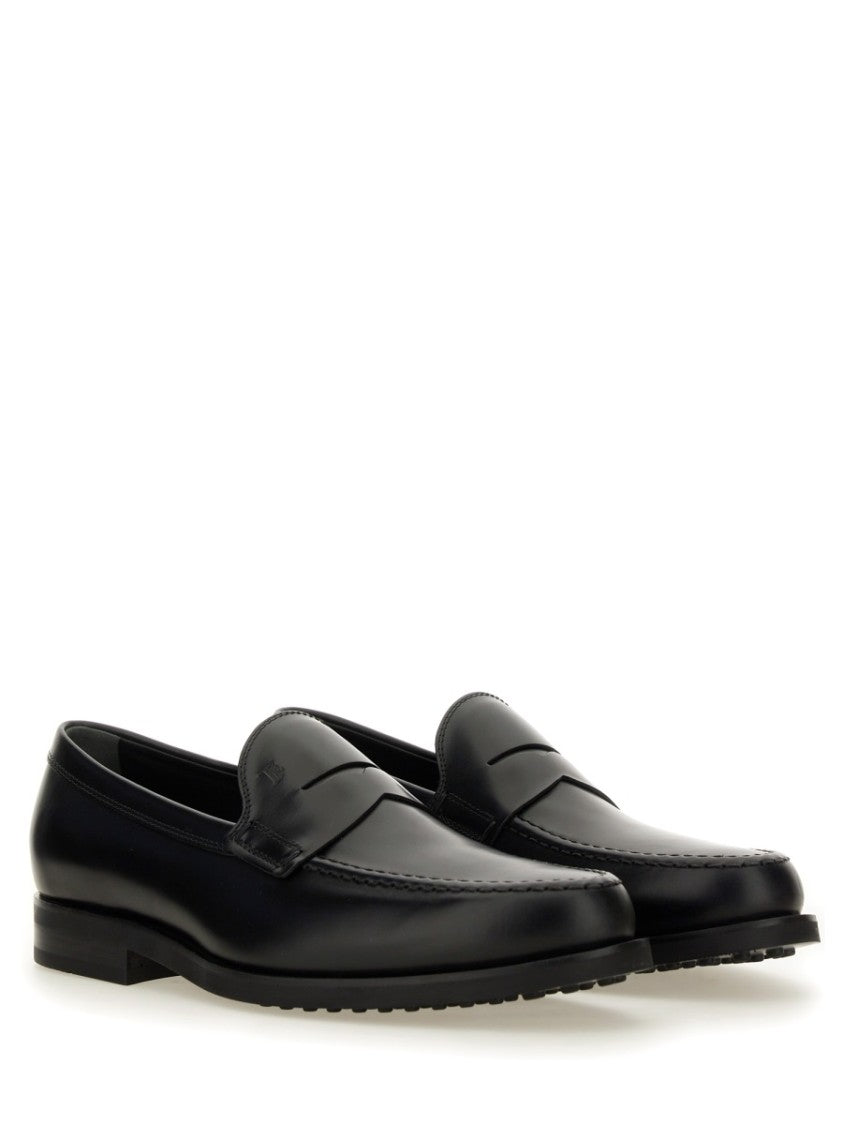 Tod's Smooth Leather Moccasin Loafers With Subtle Stitching