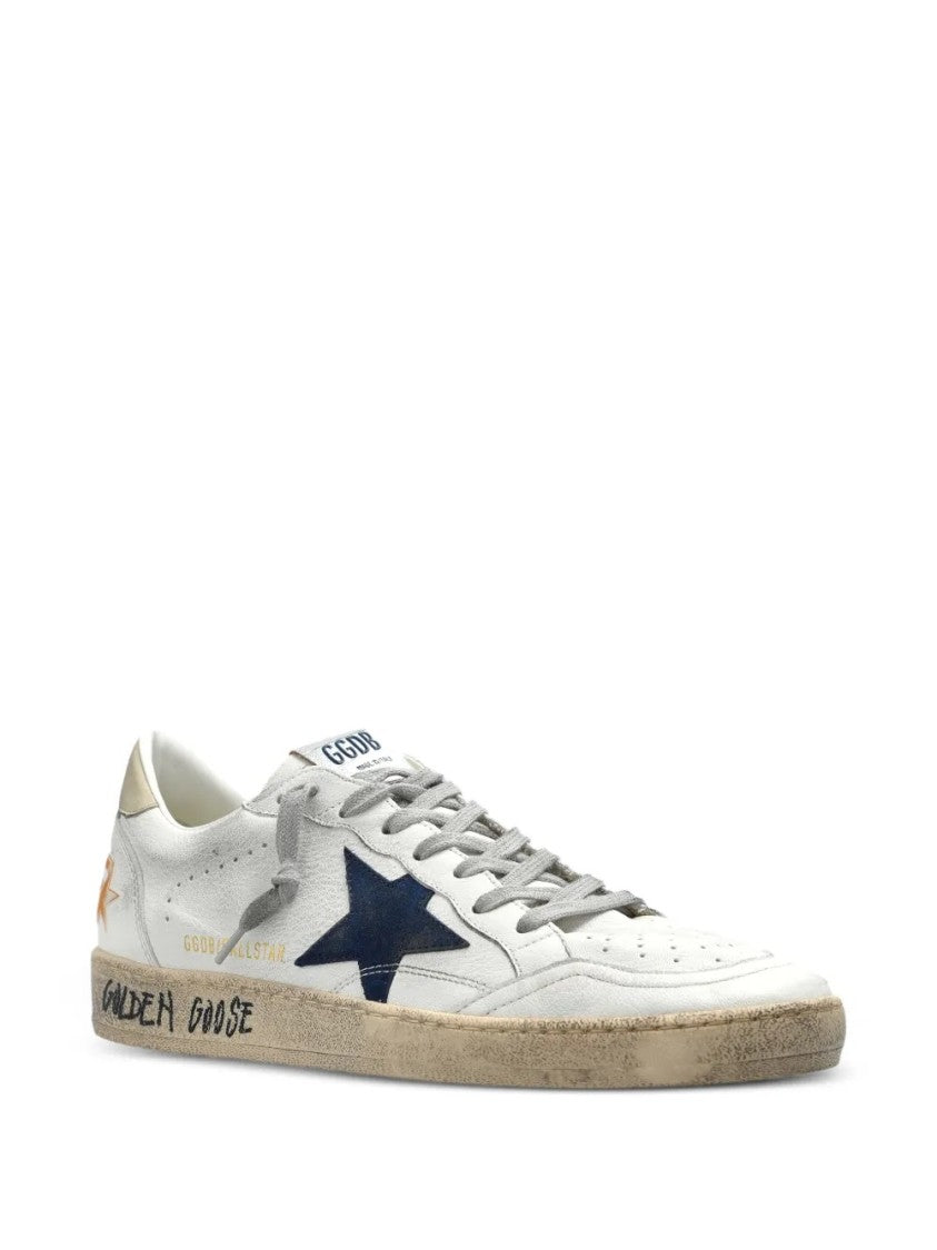 Golden Goose Distressed Low-Top Sneakers With Star Detail And Vintage Aesthetic