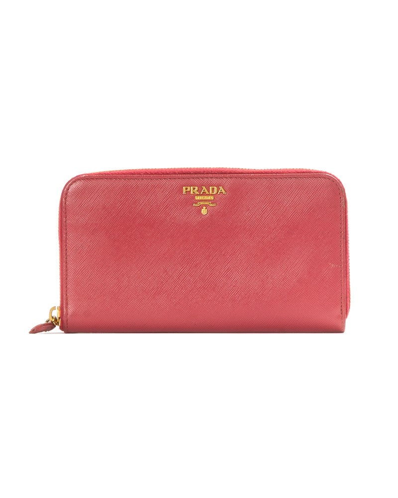 Prada Zippy Saffiano Wallet In Fuchsia