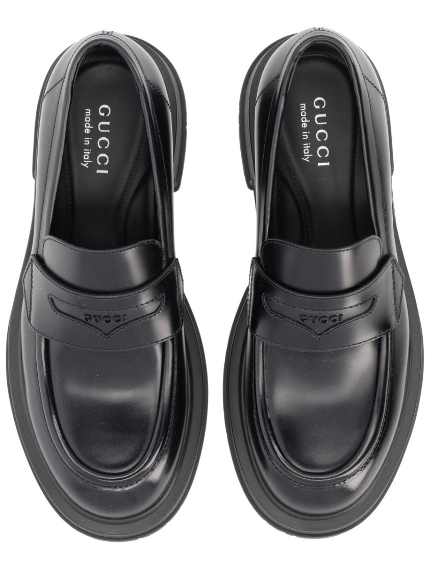 Gucci Black Leather Penny Loafers