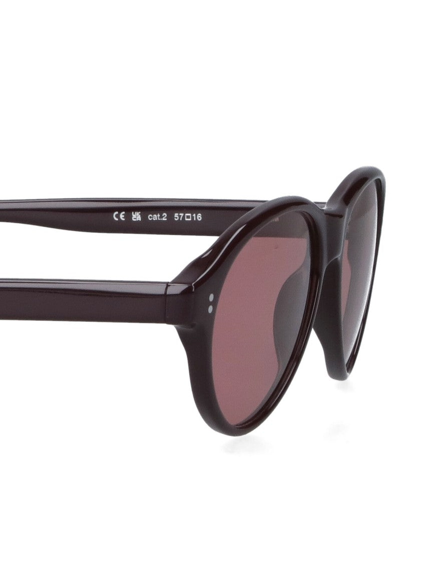 Chimi Contemporary Black Sunglasses With Smooth Frame And Tinted Lenses