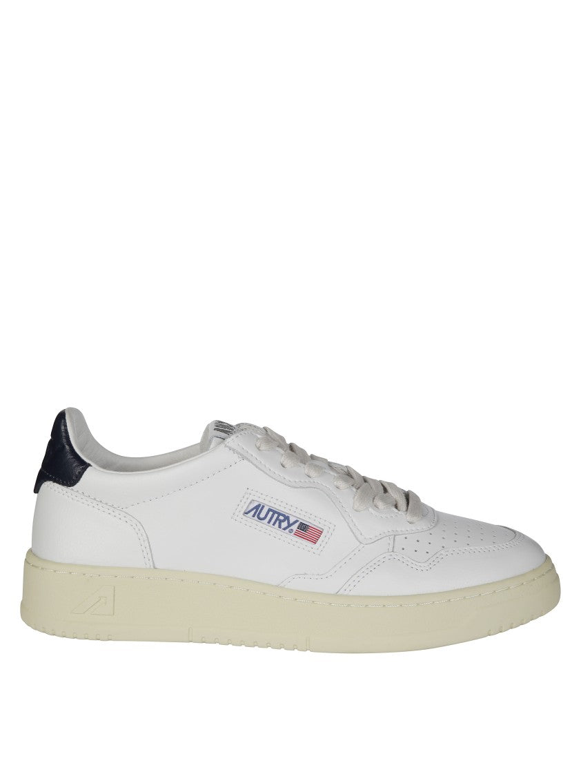 Autry White Medalist Low Navy Heel Sneakers