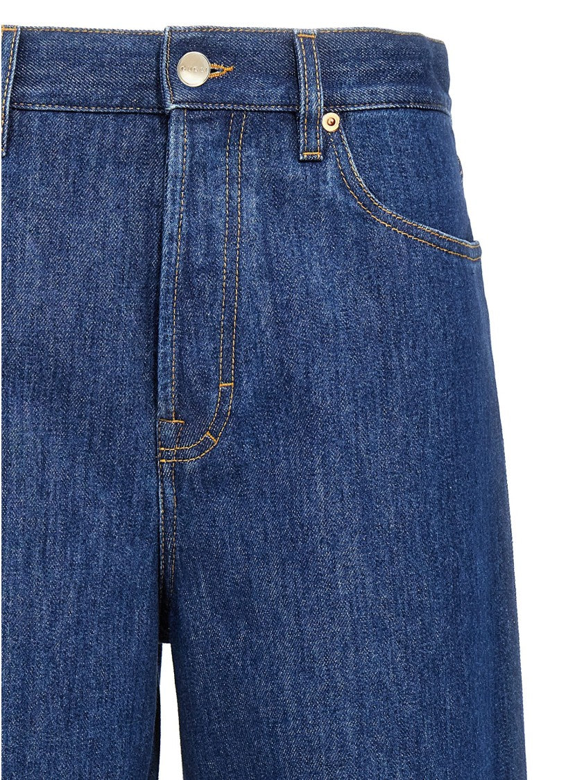 Gucci Loose-Fit Cotton Denim Jeans With Leather Logo Tag
