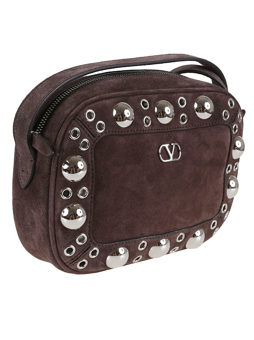 Valentino Garavani Dome-Shaped Crossbody Bag With Metallic Eyelets And Adjustable Strap